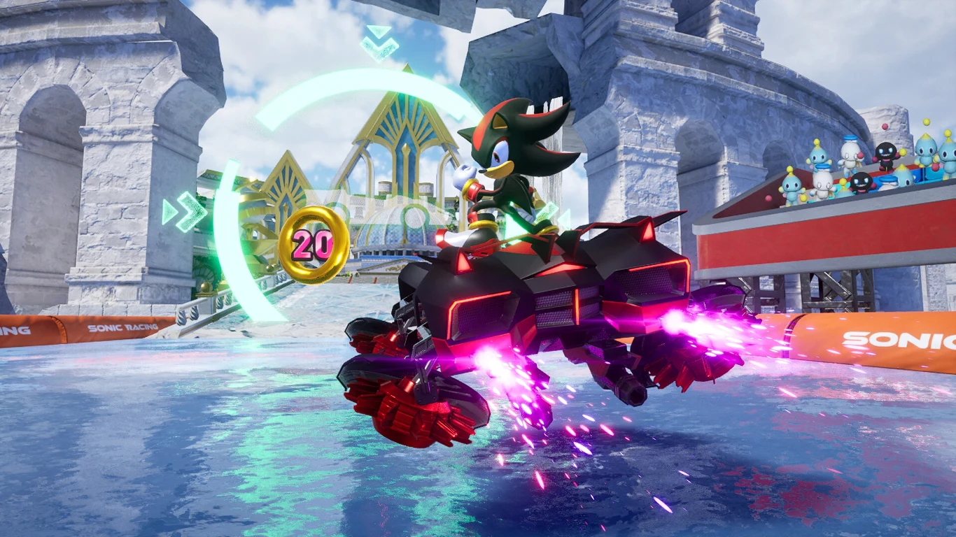 Postać Shadow the Hedgehog prowadzi futurystyczny pojazd wyścigowy w dynamicznej scenerii areny z elementami architektury fantastycznej, licznymi kolorowymi efektami świetlnymi oraz znaczkiem pierścienia z liczbą 20.