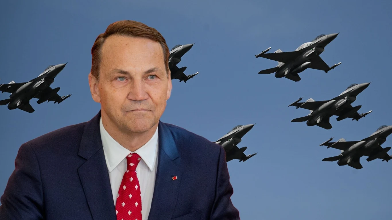 Polacy ocenili pomysł Sikorskiego. Chodzi o strącanie rosyjskich dronów (zdj. ilustracyjne) Mężczyzna w garniturze z czerwonym krawatem znajduje się na pierwszym planie, w tle widoczne są przelatujące w szyku myśliwce wojskowe na niebieskim niebie.