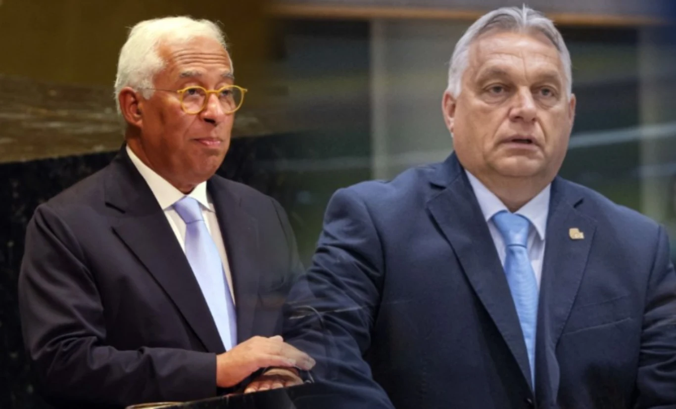 António Costa, przewodniczący Rady Europejskiej i premier Węgier Viktor Orban Dwóch elegancko ubranych mężczyzn stojących w oficjalnych strojach, jeden z nich ma białe włosy i okulary, drugi jest szpakowaty. Oboje mają poważny wyraz twarzy. Tło rozmyte, sugerujące miejsce oficjalne lub instytucjonalne.