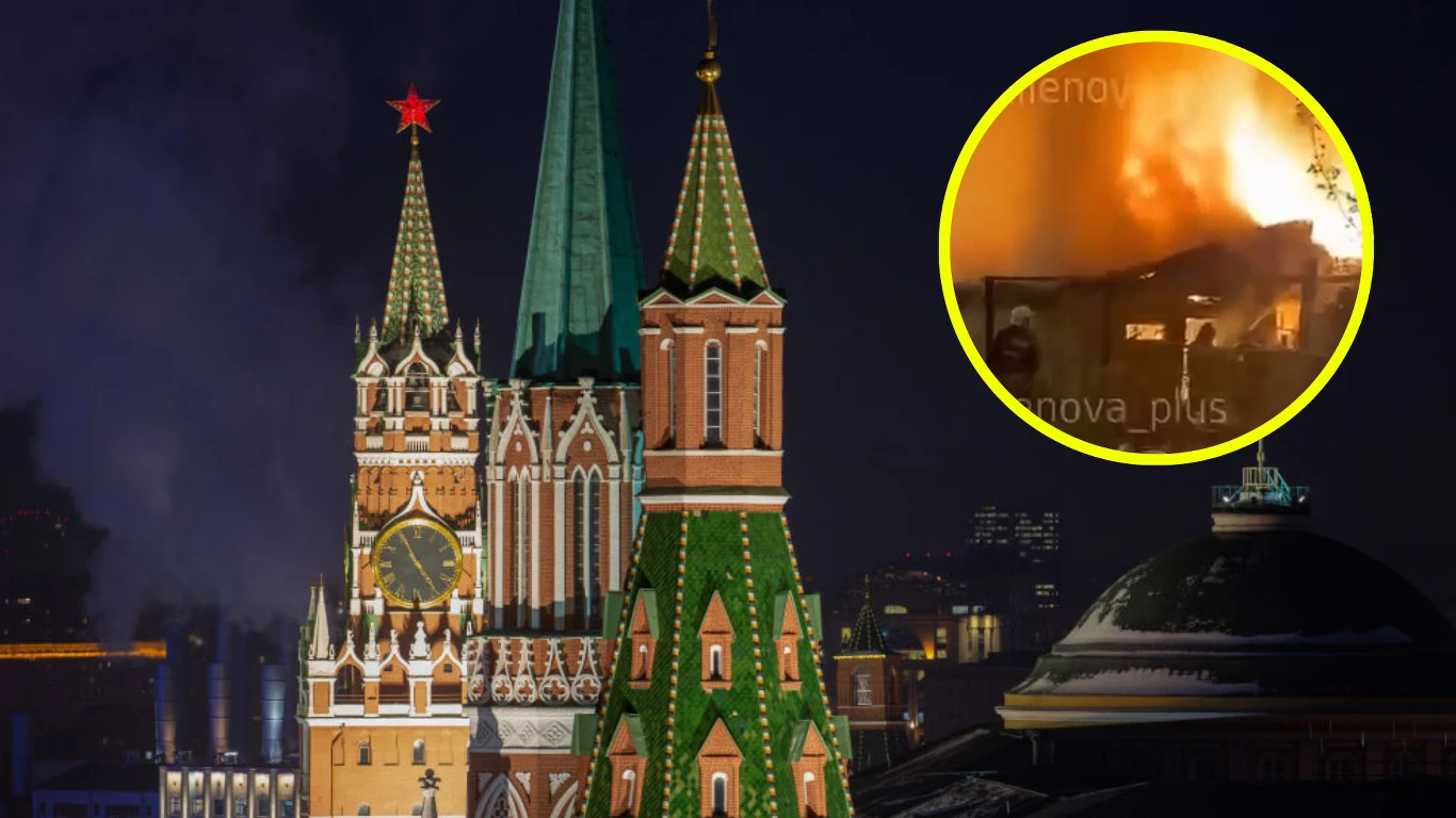 Nocny atak na obwód moskiewski, dwie osoby nie żyją Wieże Kremla nocą podświetlone światłem miejskim, w prawym górnym rogu widoczna okrągła wstawka ukazująca intensywne płomienie i pożar budynku.