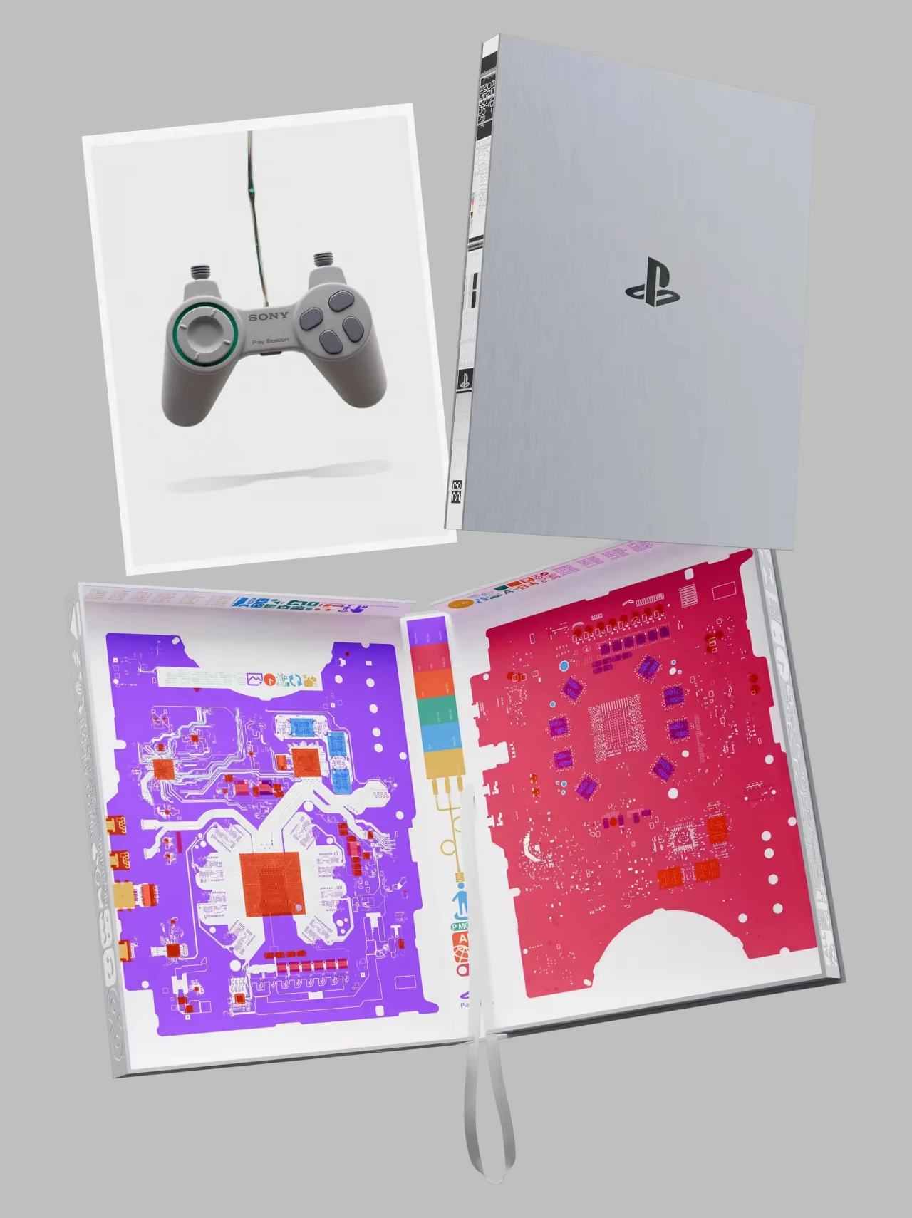 Album "PlayStation: The First 30 Years" w wydaniu Deluxe Kontroler PlayStation oraz otwarta książka z okładką przypominającą konsolę PlayStation, w środku znajdują się schematy lub ilustracje układów elektronicznych w kolorach fioletowym, czerwonym i białym.