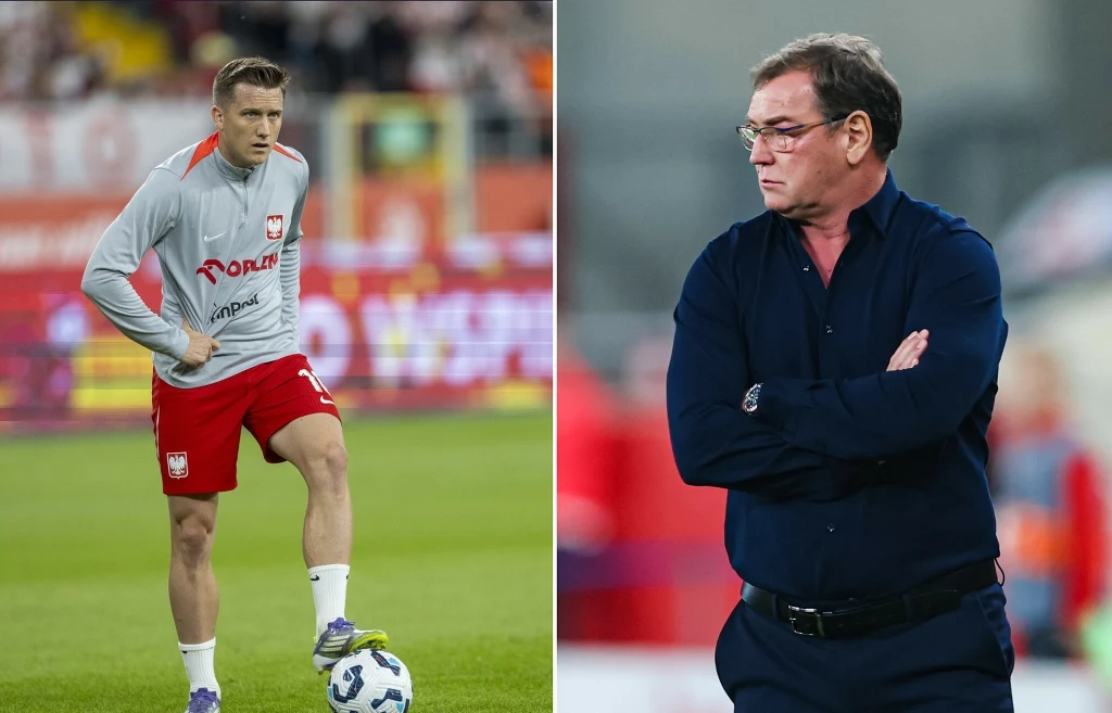 Piotr Zieliński i Jan Urban Po lewej stronie piłkarz w stroju reprezentacji Polski podczas przygotowań na boisku, po prawej trener w ciemnej koszuli z założonymi rękami, skupiony na obserwacji wydarzeń.