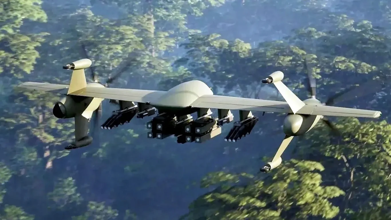 Lockheed Martin prezentuje drony z przyszłości z rodziny Nomad. Wojskowy dron uzbrojony w rakiety leci nad gęstym lasem, cztery wirniki umożliwiają mu stabilny lot, a konstrukcja wygląda nowocześnie i zaawansowanie technologicznie.