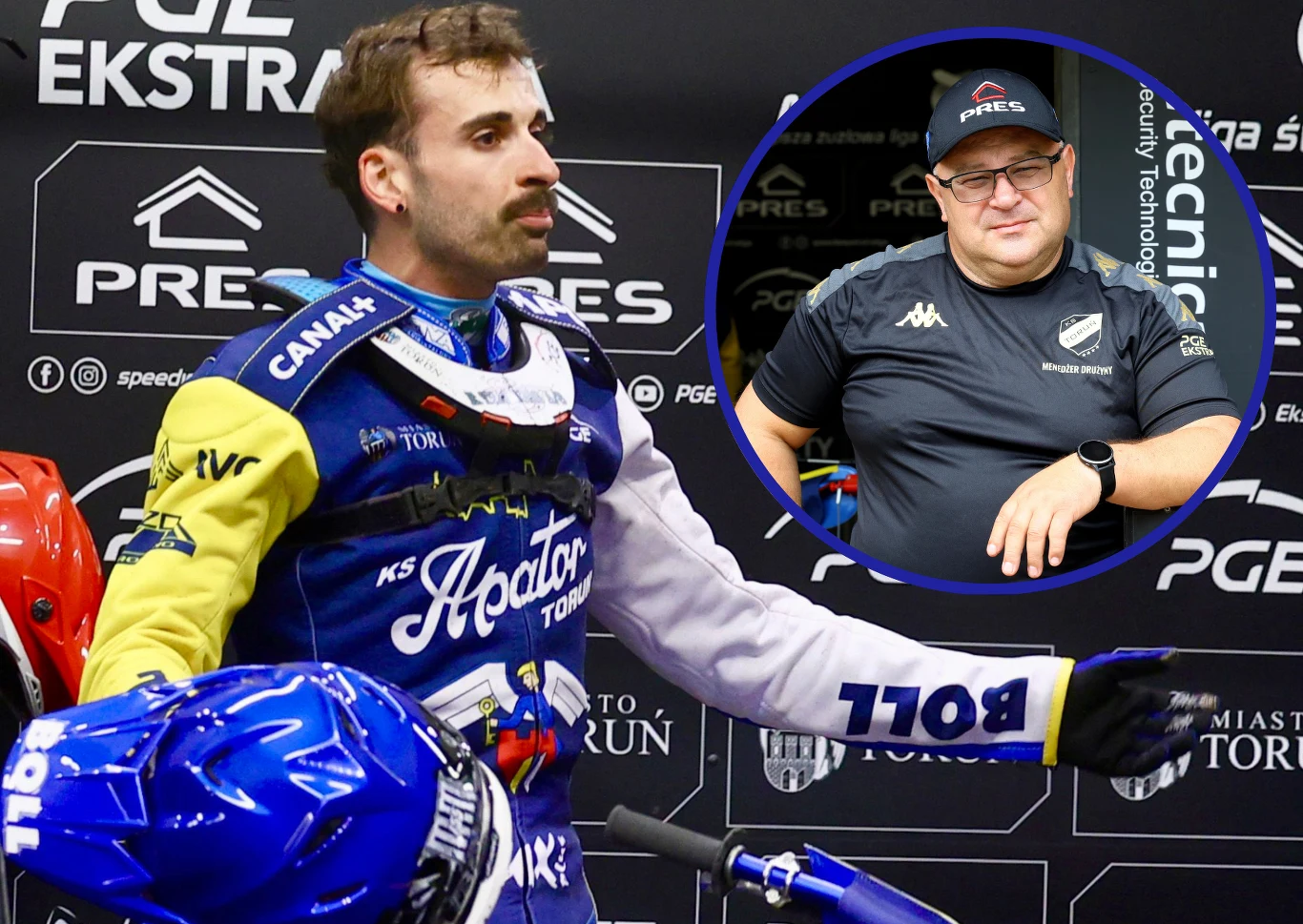 Mikkel Michelsen skreślony z Grand Prix 2026. Zaskakujący komentarz trenera Apatora Toruń. Żużlowiec w stroju sportowym drużyny Apator Toruń stoi z motocyklem na tle ściany z logo sponsora, w okrągłym wstawieniu widoczny trener lub członek zespołu w sportowej koszulce i czapce.