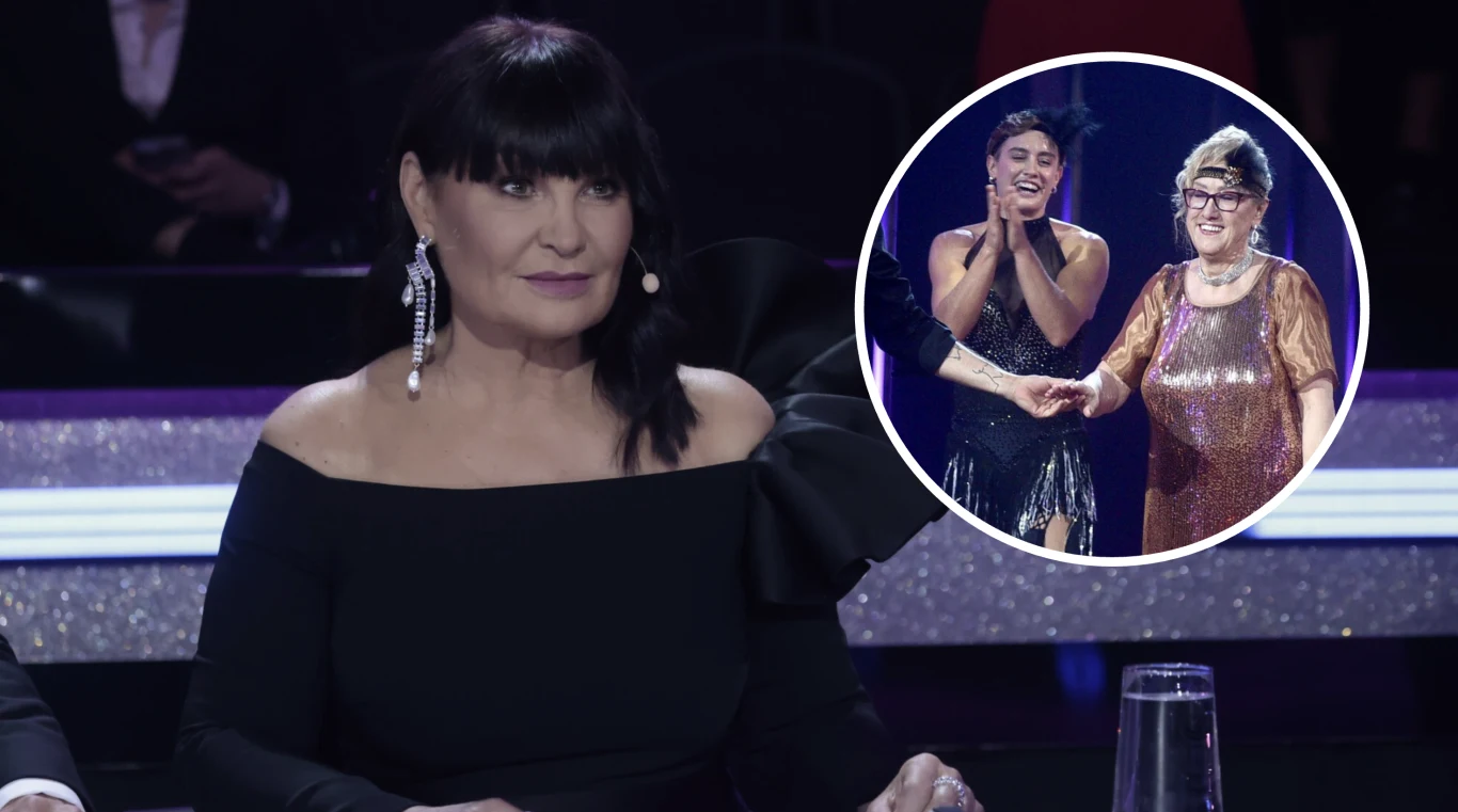 Kobieta w czarnej sukni z długimi rękawami siedzi przy stole jurorskim, w tle widoczne są fragmenty studia telewizyjnego. W okrągłej wstawce dwie kobiety trzymają się za ręce na scenie, obie uśmiechnięte, jedna w czarnej, druga w błyszczącej sukni.