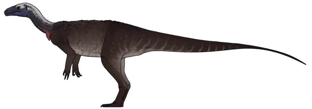 Duży dinozaur o długim ogonie, silnych tylnych kończynach i masywnej budowie, z jasnoszarą głową i ciemniejszym ciałem.