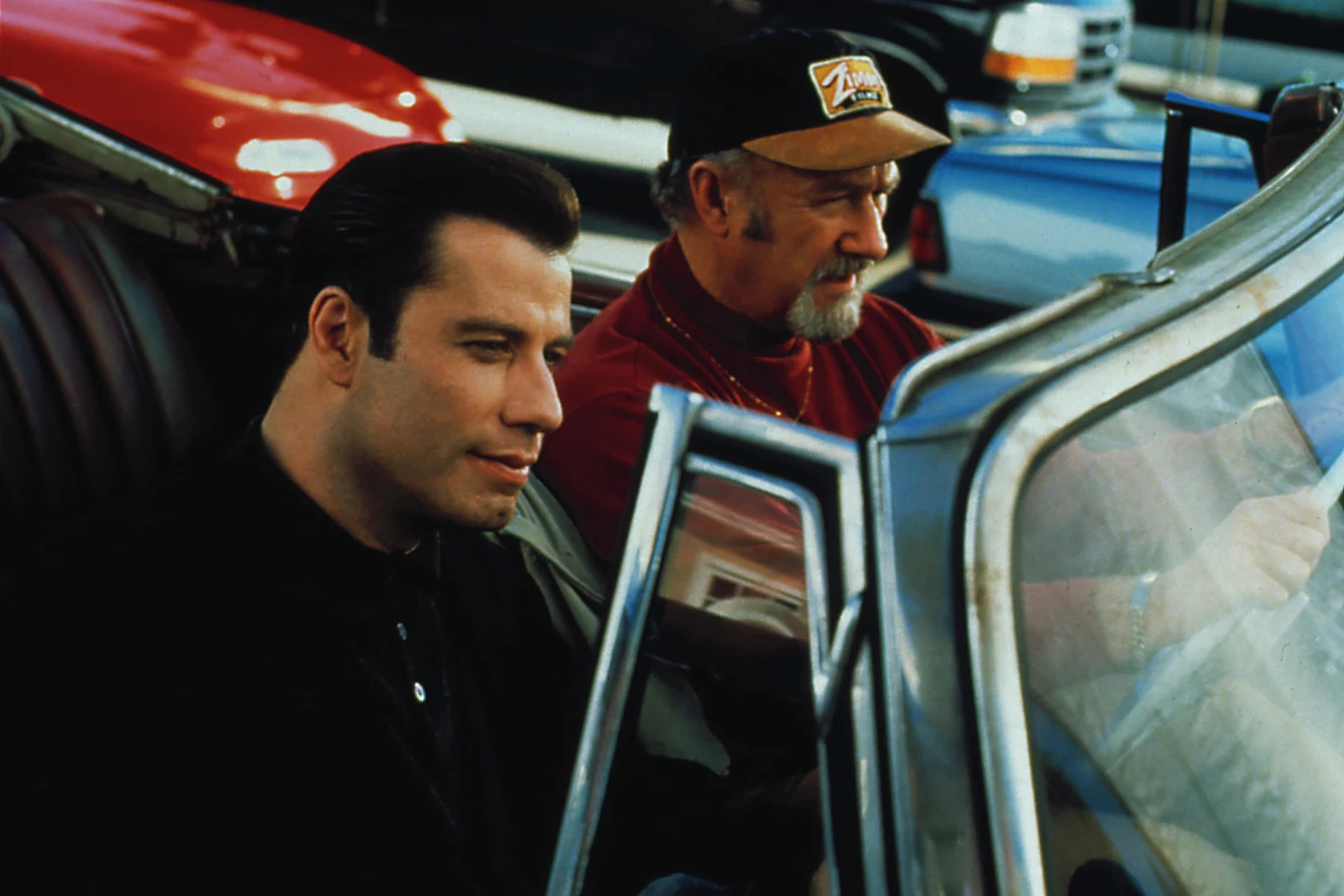 John Travolta i Gene Hackman w filmie "Dorwać małego"