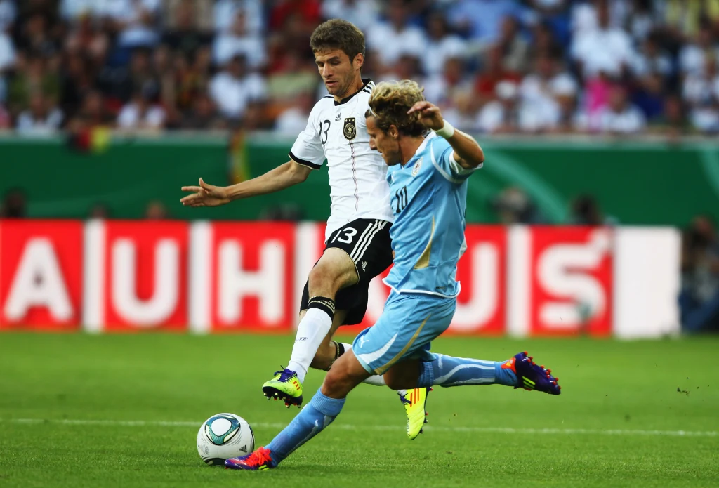 Thomas Muller i Diego Forlan