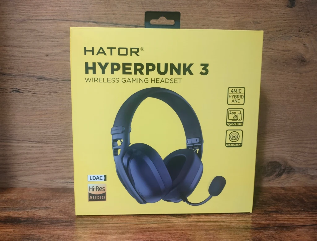 Żółte opakowanie słuchawek gamingowych Hator Hyperpunk 3 z ilustracją czarnych słuchawek z mikrofonem na wysięgniku oraz informacjami o funkcjach, takich jak LDAC, Hi-Res Audio, 4 MIC Hybrid ANC.