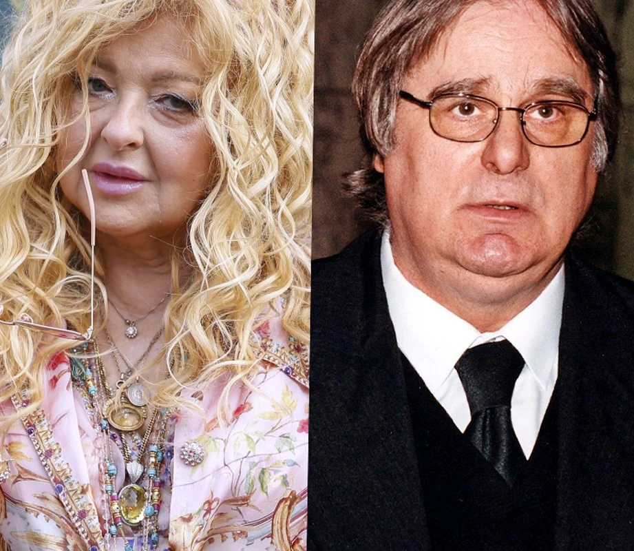 Magda Gessler, Marek Perepeczko Dwie osoby pokazane w portretach, jedna kobieta o blond, kręconych włosach i licznymi naszyjnikami ubrana w kolorową bluzkę, druga osoba to mężczyzna w okularach, ciemnym garniturze i białej koszuli, prezentujący poważny wyraz twarzy.