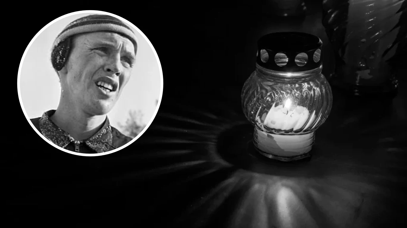 Portret mężczyzny w czapce i nausznikach w czarno-białym kółku po lewej stronie, po prawej zapalony znicz na ciemnym tle, odbijający światło w promieniste wzory.