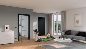 Ciekawym rozwiązaniem aranżacyjnym są drzwi w kolorze czarnym