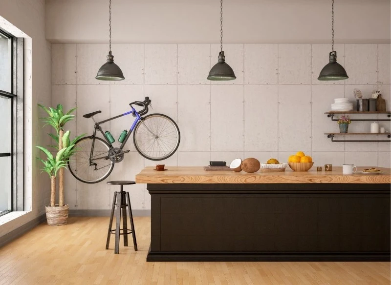Kuchnia w stylu loftowym najczęściej kojarzona jest z wykorzystaniem drewnianych mebli z metalowymi elementami