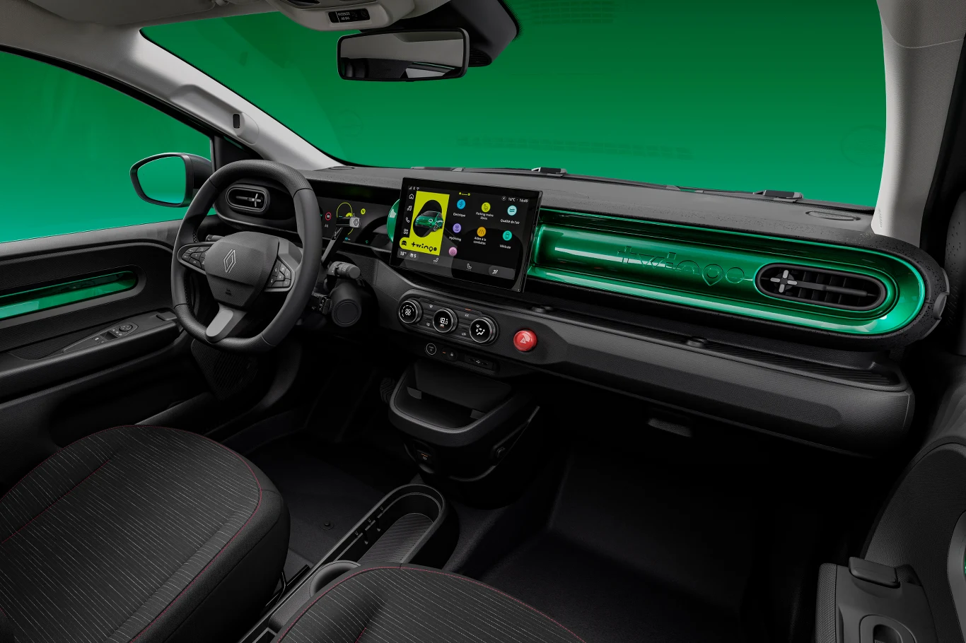 Nowoczesne wnętrze samochodu z cyfrowym panelem kierowcy, dużym ekranem dotykowym pośrodku deski rozdzielczej i akcentami w zielonym kolorze, wygodne, tekstylne fotele oraz ergonomiczny układ przycisków i paneli.