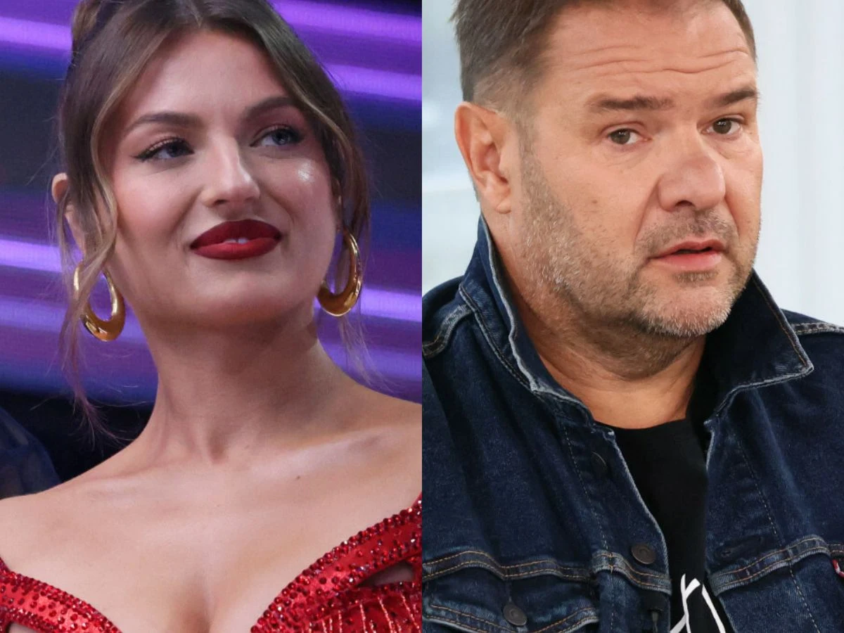Izabela Skierska, Tomasz Karolak Kobieta w czerwonej sukni z dużymi złotymi kolczykami oraz mężczyzna w ciemnej kurtce dżinsowej na podzielonym kadrze, oboje spoglądają w różnych kierunkach, tło rozmyte z delikatnym oświetleniem.