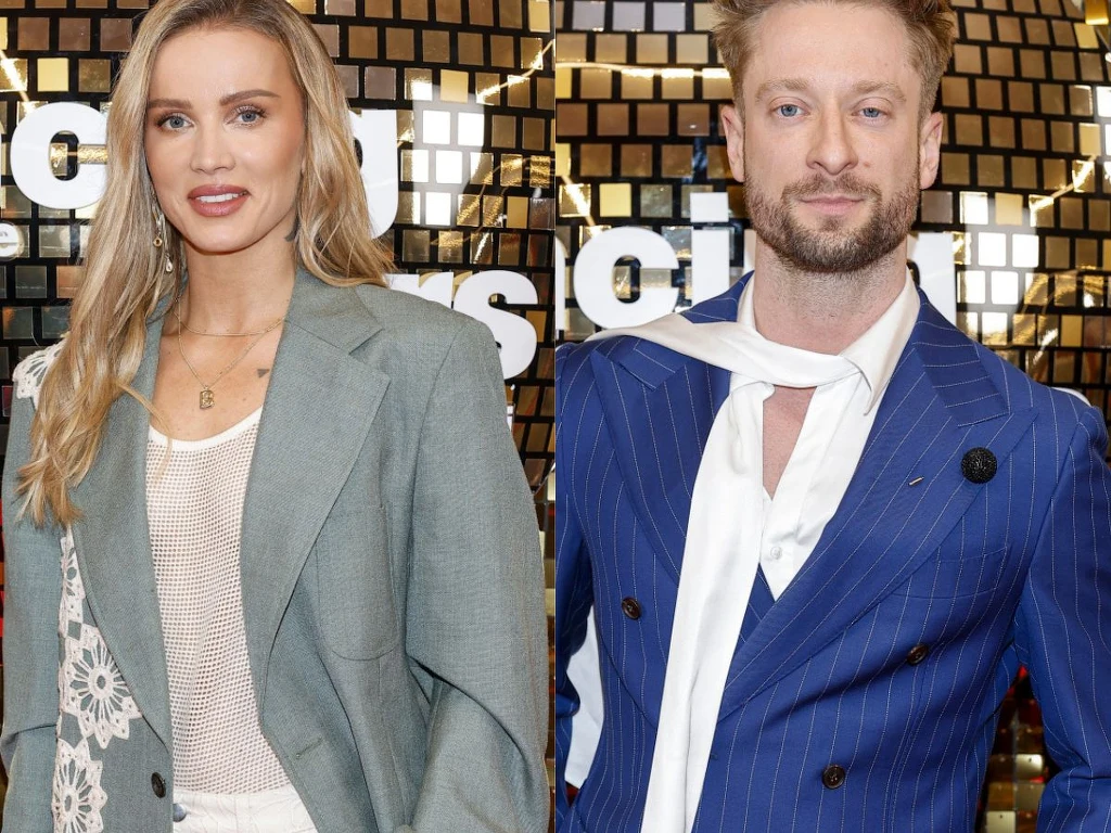 Na ściance pojawili się także Maffashion i Michał Danilczuk Dwie elegancko ubrane osoby pozujące na tle złotej, błyszczącej ścianki. Kobieta ma długie blond włosy, nosi jasny żakiet, koronkową bluzkę oraz delikatną biżuterię. Mężczyzna ubrany w niebieski garnitur w prążki, białą apaszkę i białą koszulę, patrzy ...