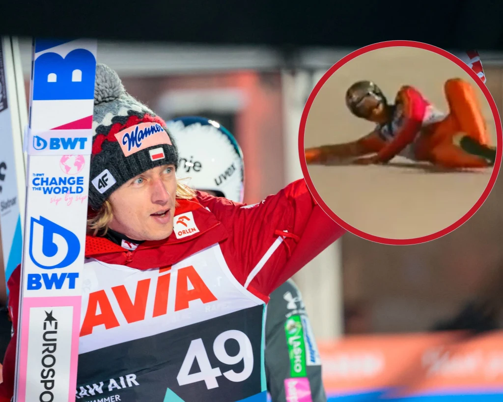 Zawodnik w stroju narciarskim cieszy się po skoku narciarskim, trzymając narty, w tle widać elementy reklamowe oraz innych uczestników zawodów. W prawym górnym rogu znajduje się wstawka ukazująca upadek narciarza podczas lądowania.