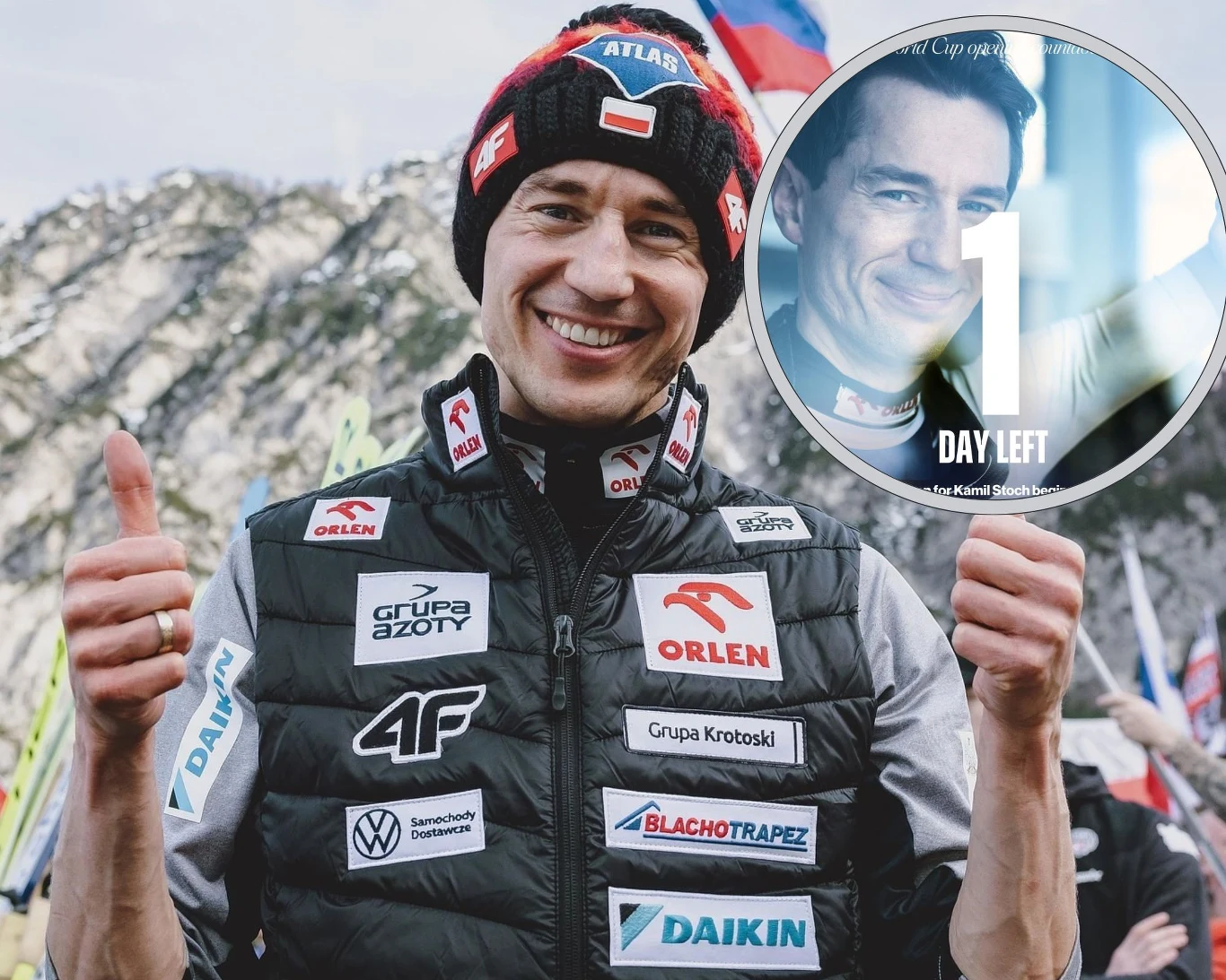 Kamil Stoch zaczyna swój ostatni sezon Pucharu Świata w skokach narciarskich Uśmiechnięty sportowiec w kurtce z licznymi logotypami sponsorów na tle gór oraz licznych flag kibiców, pokazuje dwa uniesione kciuki. W prawym górnym rogu znajduje się okrągła grafika z napisem '1 day left' i portretem tego samego sportowca.
