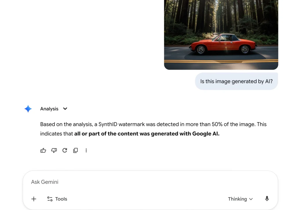 SynthID w aplikacji Gemini oceni, w jakim stopniu obraz jest dziełem generatywnej AI Zrzut ekranu przedstawia fragment interfejsu czatu z analizą obrazu oraz wizerunkiem czerwonego samochodu na tle leśnej drogi. Analiza tekstowa informuje o wykryciu znaku wodnego SynthID w połowie obrazu, sugerując, że treść została wygenerowana przez ...