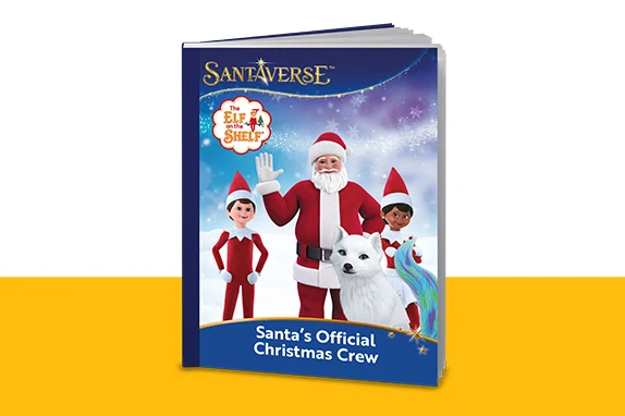 Okładka książki z postaciami Świętego Mikołaja, dwóch elfów, białego niedźwiedzia oraz jednorożca na tle nieba w stylu bajkowym. Książka utrzymana w tematyce świątecznej, z tytułem dotyczącym oficjalnej drużyny świątecznej.