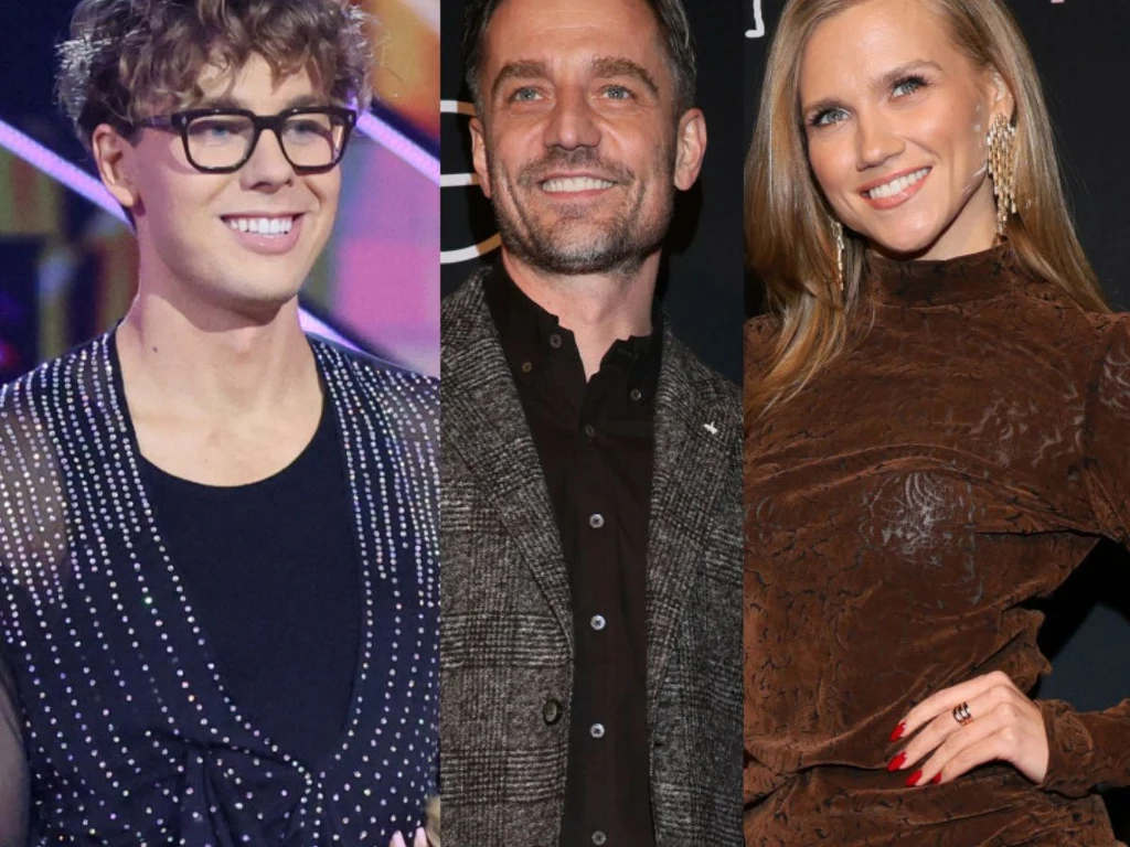 Trzy osoby ustawione obok siebie, każda patrzy w stronę aparatu i uśmiecha się. Mężczyzna po lewej nosi ciemne okulary i błyszczącą marynarkę, środkowy ma zarost i ubrany jest w elegancką marynarkę, kobieta po prawej rozpuszczone blond włosy i brązową ...