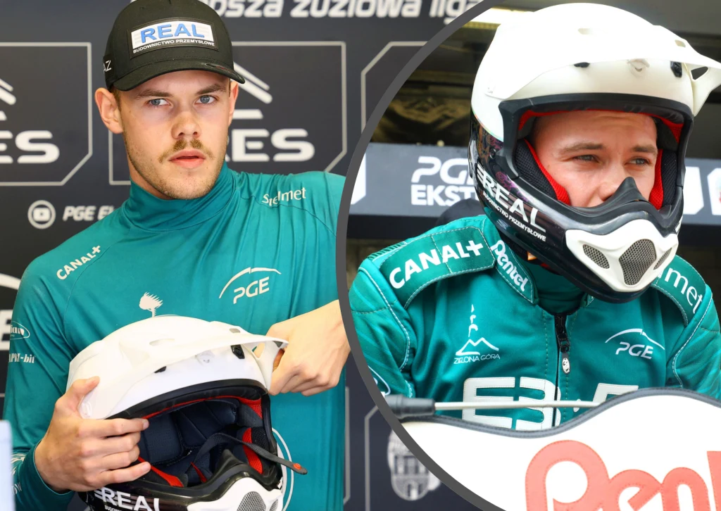 Falubaz Zielona Góra szuka drugiego Damiana Ratajczaka, bo w 2027 zostanie bez juniorów. Zawodnik żużlowy w zielonym stroju drużynowym PGE z kaskiem w dłoniach, na drugim planie na zbliżeniu w kasku, tło z logotypami sponsorskimi, atmosfera przygotowań do zawodów sportowych.