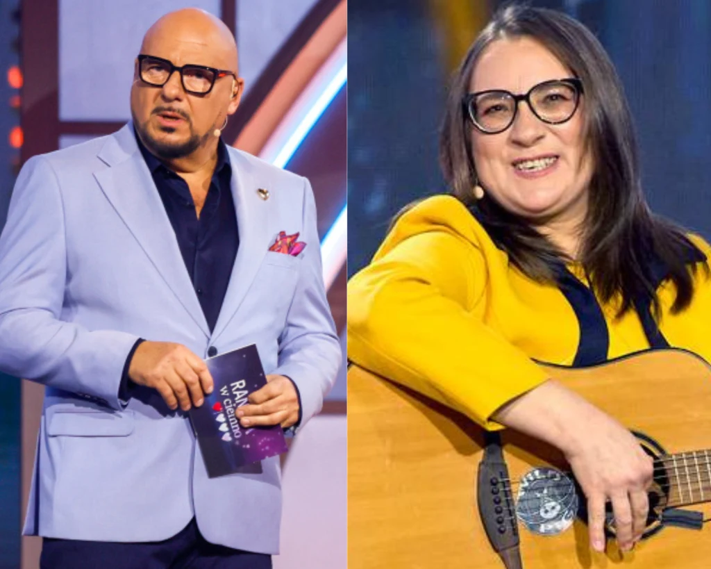 Niespodziewane sceny w "Randce w ciemno" Mężczyzna w jasnofioletowej marynarce i ciemnych okularach z kartką w ręku stoi na scenie, po lewej stronie zdjęcia. Po prawej kobieta w żółtym żakiecie oraz ciemnych okularach gra na gitarze i uśmiecha się.