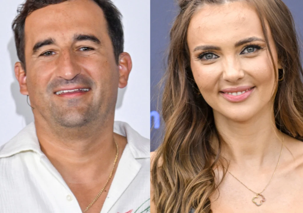 Michał Koterski, Marcela Leszczak Dwie osoby pokazane w ujęciu portretowym, mężczyzna po lewej stronie oraz kobieta po prawej, oboje uśmiechnięci, na neutralnym tle.