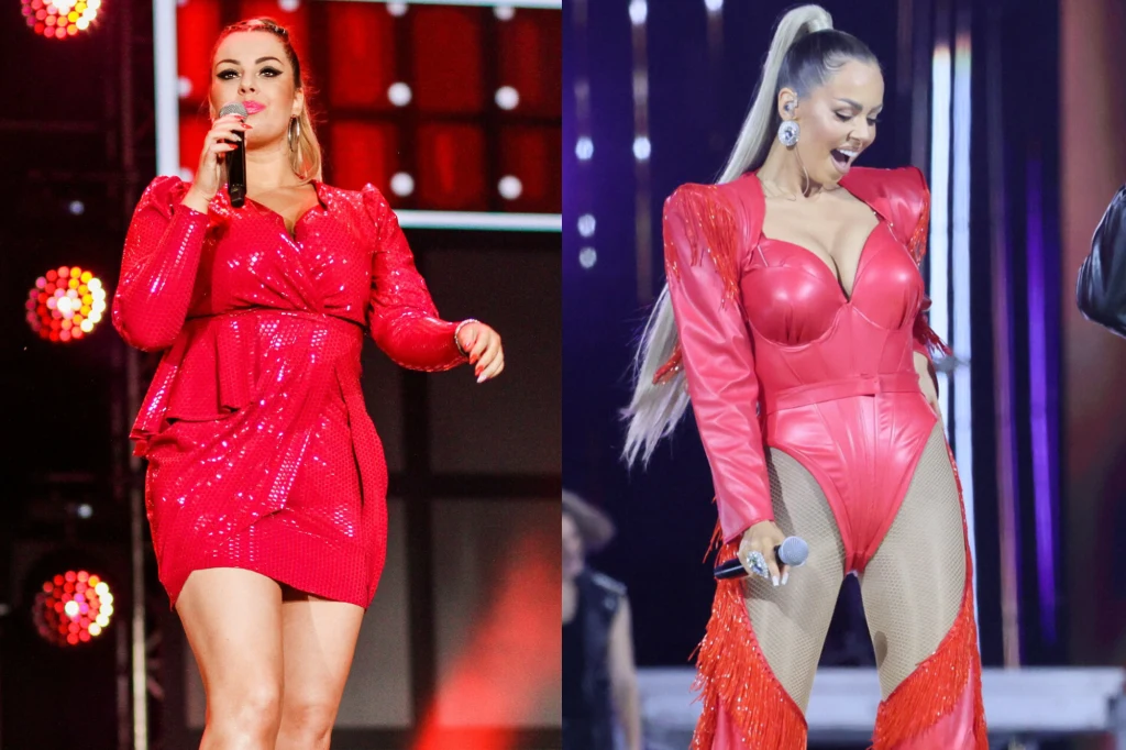 Dwie kobiety w czerwonych, błyszczących i efektownych kostiumach scenicznych, obie śpiewają na scenie, każda z nich podkreśla sylwetkę strojem, oświetlenie koncertowe wzmacnia teatralny charakter występu.