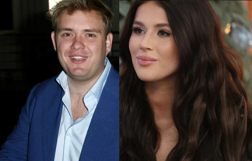 Kevin Mglej i Roxie Węgiel Mężczyzna w niebieskiej marynarce i białej koszuli obok kobiety o ciemnych, długich włosach z delikatnym makijażem. Oboje znajdują się w dobrze oświetlonym pomieszczeniu.