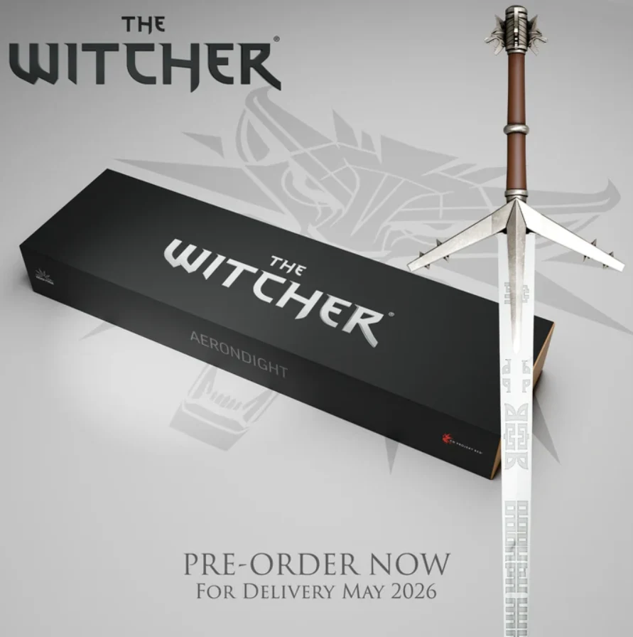 Srebrny miecz o ozdobnej głowni i ostrzu ze wzorami runicznymi, oparty o czarne pudełko z logo The Witcher i napisem Aerondight, na tle widocznego, szarego lwa będącego symbolem wiedźmińskim, oraz informacja o przedsprzedaży i terminie dostawy.