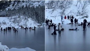 Grupa turystów weszła na taflę Morskiego Oka