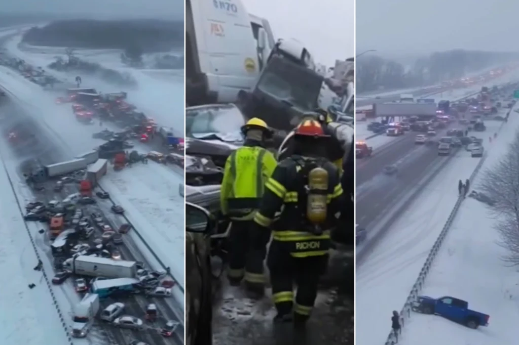 Wielokilometrowy karambol na zaśnieżonej autostradzie, setki rozbitych pojazdów, obecność służb ratowniczych i strażaków próbujących opanować sytuację, trudne warunki pogodowe utrudniające widoczność i akcję ratunkową.
