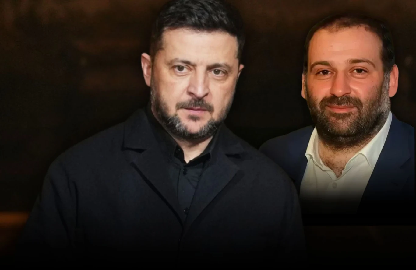 Sąd nakazał zatrzymanie byłego wspólnika Wołodymyra Zełenskiego Tymura Mindicza Dwóch mężczyzn w ciemnych ubraniach na ciemnym tle, jeden z nich stoi na pierwszym planie, drugi znajduje się za nim lekko z prawej strony.