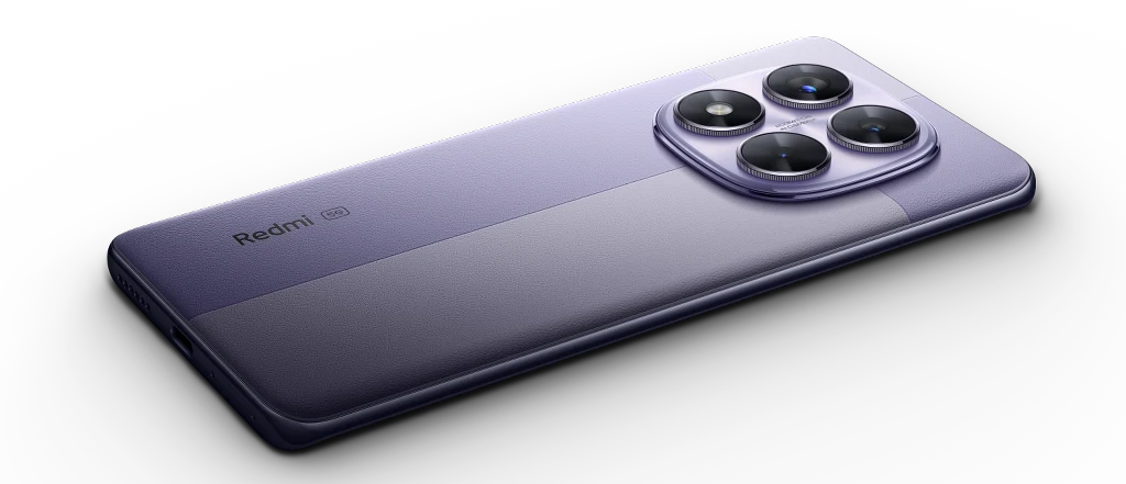 Nowoczesny smartfon w fioletowej obudowie, widoczny z tyłu, z podkreśleniem czterech dużych obiektywów aparatu umieszczonych na wyraźnie zaznaczonym module. Obudowa posiada minimalistyczny design i matowe wykończenie.