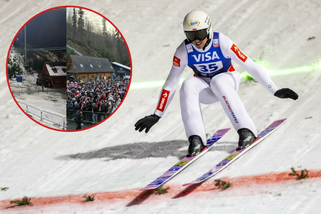 Zawodnik w białym kombinezonie ze startowym numerem 35 wykonuje skok narciarski na skoczni, w tle widoczny świeży śnieg i ślady nart, w kółku po lewej stronie tłum kibiców oraz drewniany domek w otoczeniu gór