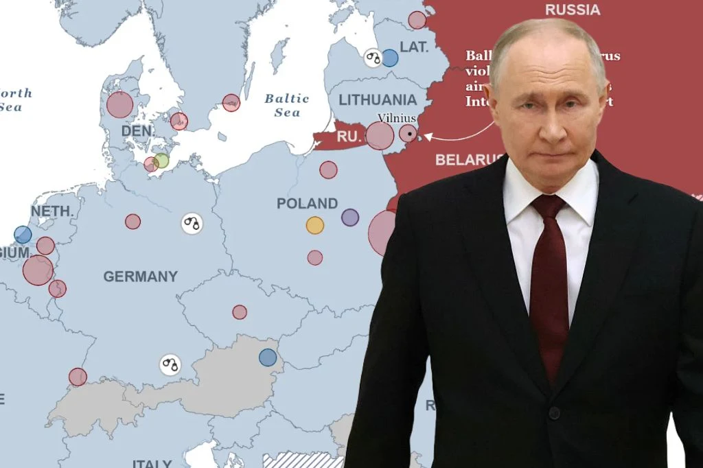 Rosja prowadzi wojnę hybrydową w Europie. "FT": Wielkie zagrożenie Postać mężczyzny w garniturze stoi na tle mapy Europy Środkowo-Wschodniej z zaznaczonymi granicami państw i różnokolorowymi okręgami, na mapie wyróżniono region Rosji wyraźnym czerwonym kolorem.