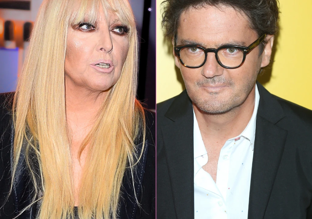 Maryla Rodowicz, Kuba Wojewódzki Dwie osoby sfotografowane w ujęciu portretowym, po lewej kobieta o długich blond włosach z mocnym makijażem, po prawej mężczyzna z ciemnymi włosami w okularach i białej koszuli pod ciemną marynarką.