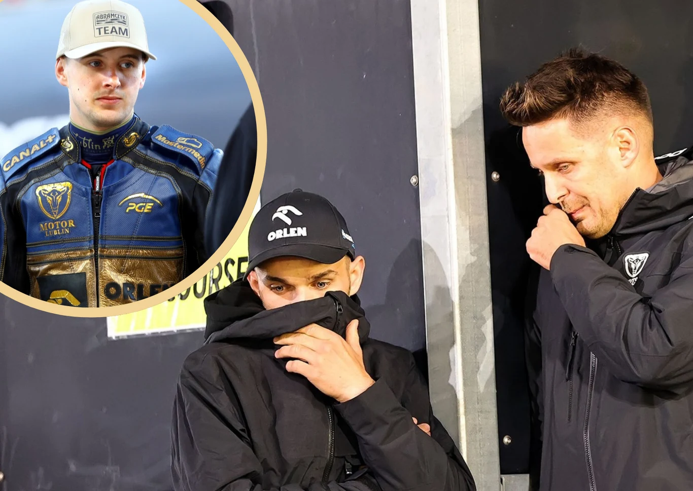 Motor nie będzie sprowadzał nowego juniora w miejsce Wiktora Przyjemskiego Dwóch mężczyzn w ciemnych kurtkach stoi obok siebie, jeden z nich zasłania usta ręką. W lewym górnym rogu znajduje się wstawka zdjęcia młodego sportowca w sportowym stroju z emblematami sponsora i drużyny.