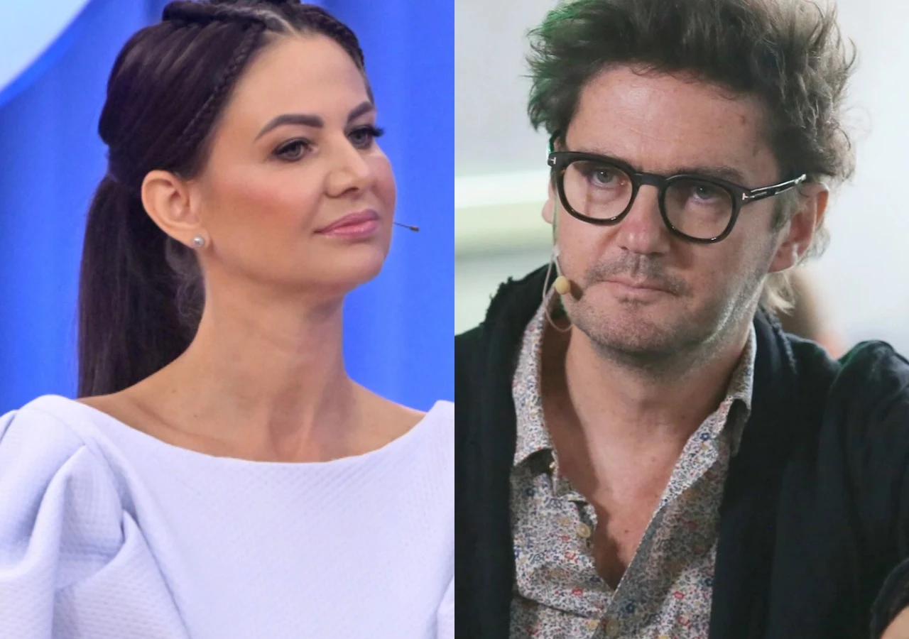 Maja Rutkowski, Kuba Wojewódzki Kobieta o ciemnych włosach spiętych w koński ogon i mężczyzna w okularach, oboje z mikrofonami przy twarzach, ubrani w eleganckie, codzienne stylizacje, stoją naprzeciw siebie na tle neutralnym.