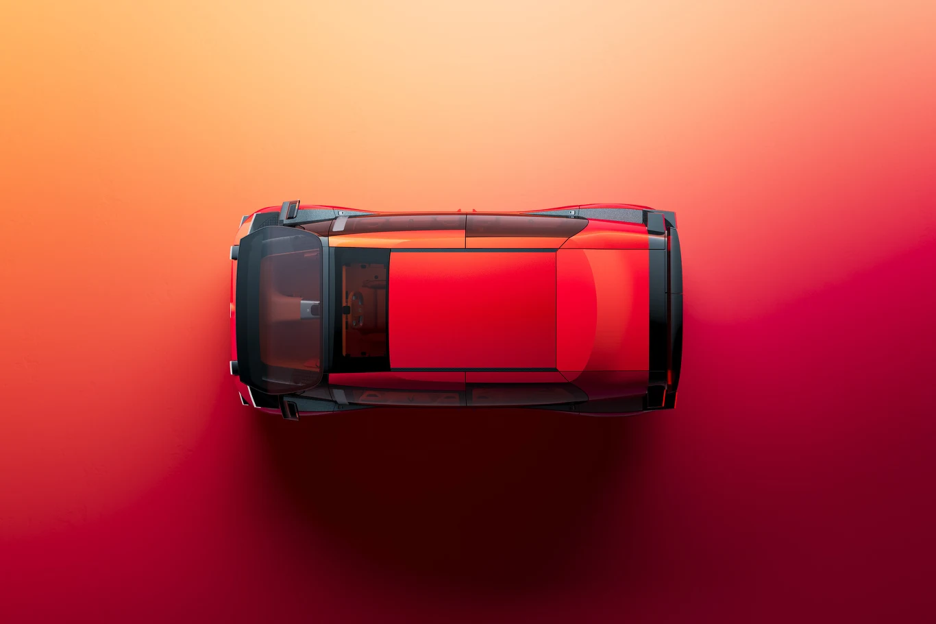 Citroen ELO mierzy 4100 mm długości - tyle, ile e-C3 Nowoczesny czerwony samochód osobowy widziany z góry na gładkim tle w gradientowych odcieniach pomarańczy i czerwieni.