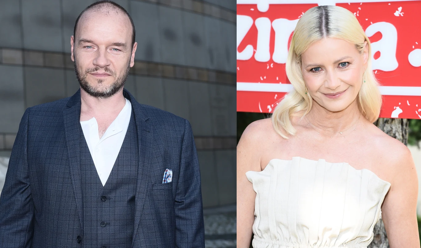 Mężczyzna w ciemnym garniturze z białą koszulą oraz kobieta z jasnymi włosami w jasnej, odkrytej sukience na tle czerwonego napisu.