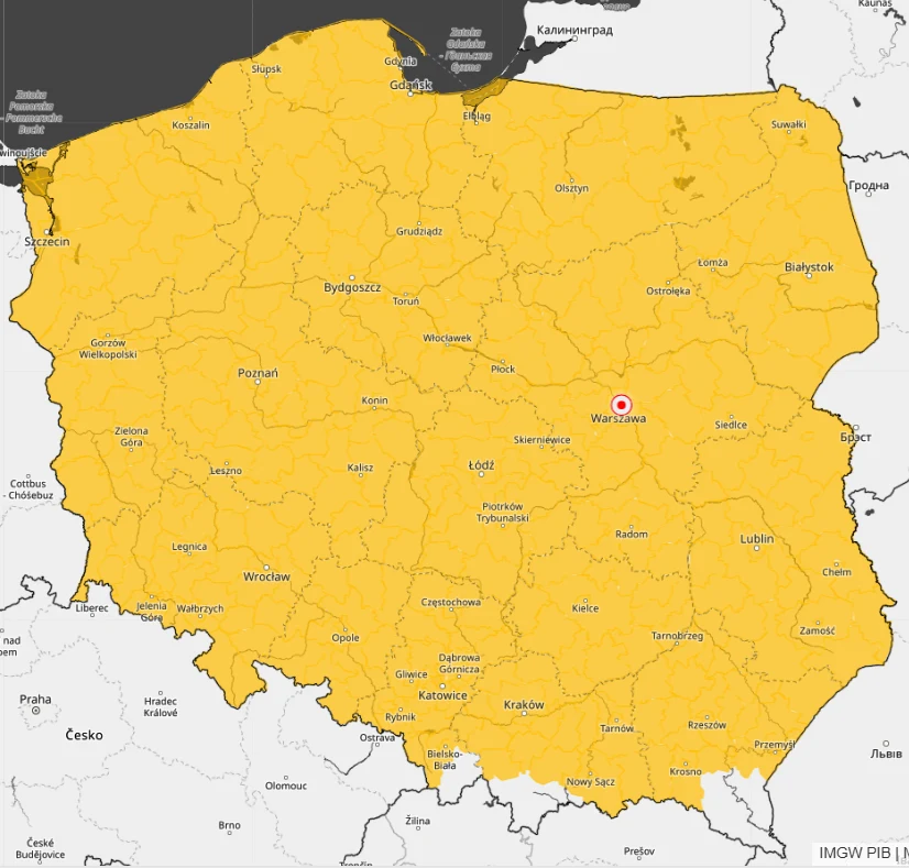 Praktycznie cały kraj objęły żółte alerty IMGW związane z oblodzeniem Mapa Polski z oznaczeniem wszystkich województw kolorem żółtym oraz zaznaczonym punktem Warszawy na środku kraju. Granice państwa, miasta oraz główne ośrodki miejskie są widoczne i czytelne.