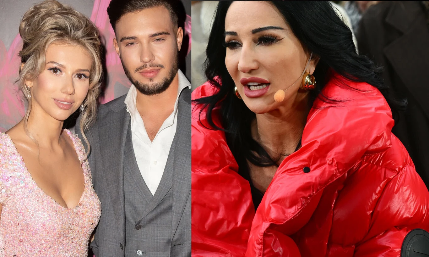 Leon Myszkowski z narzeczoną i Justyna Steczkowska Dwie kobiety i jeden mężczyzna, po lewej stronie młoda kobieta w eleganckiej sukni oraz mężczyzna w garniturze na tle jasnoróżowej dekoracji. Po prawej kobieta o ciemnych włosach w czerwonej, puchowej kurtce z mikrofonem przy twarzy.