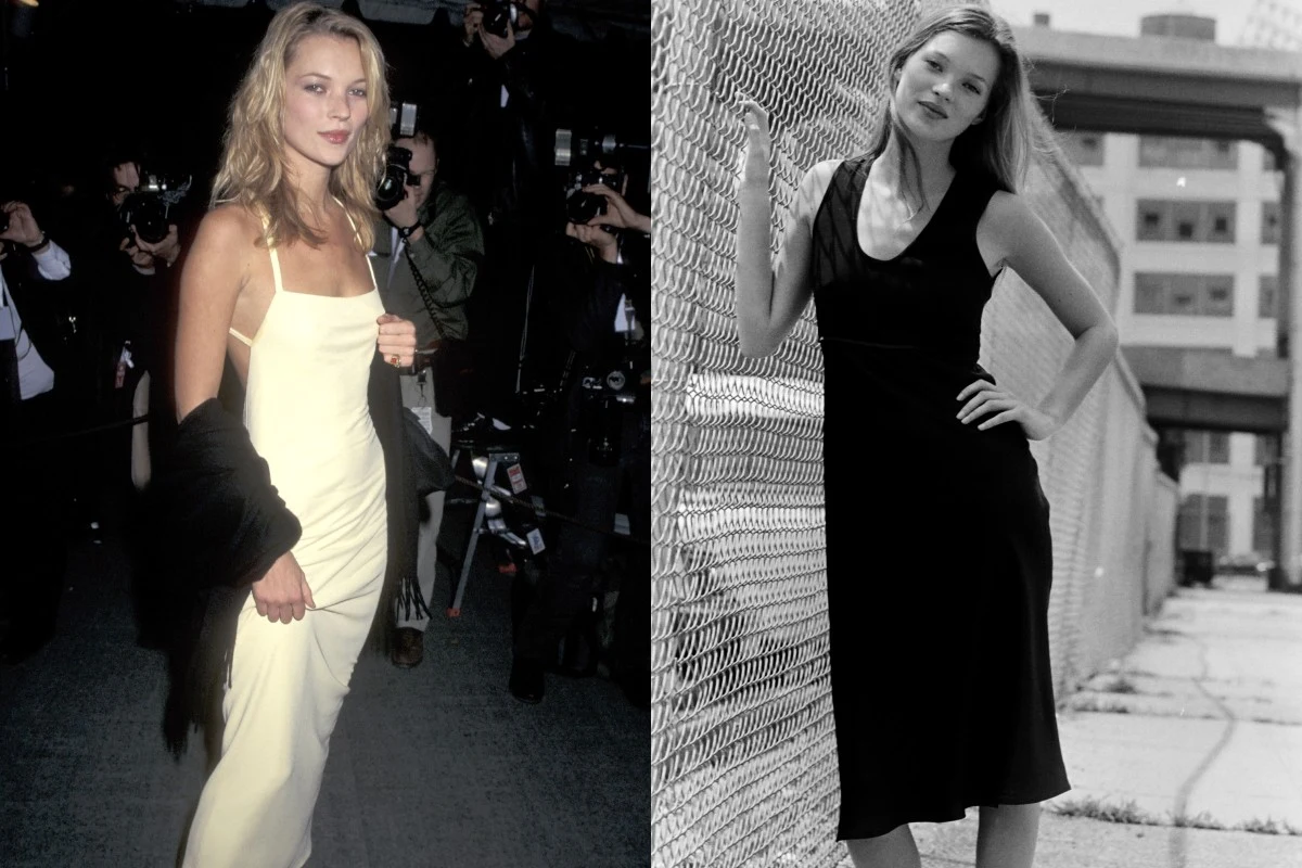 Dwie kobiety pozujące do zdjęć, jedna w eleganckiej kremowej sukni i z ciemną narzutką, druga w czarnej sukience na tle ogrodzenia z siatki, sceneria miejska.