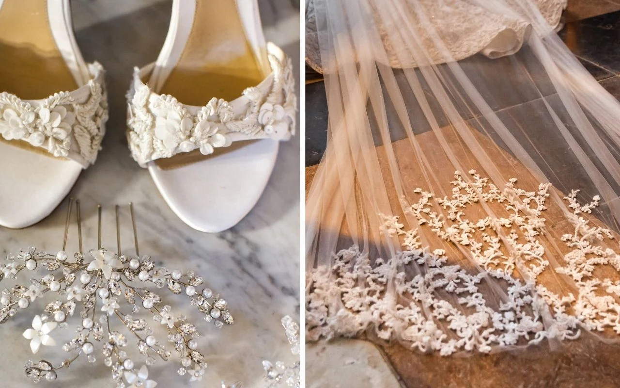 Eleganckie białe buty ślubne z kwiatowymi zdobieniami, delikatna ozdoba do włosów oraz koronka welonu obszyta kwiatowym motywem ułożona na podłodze.