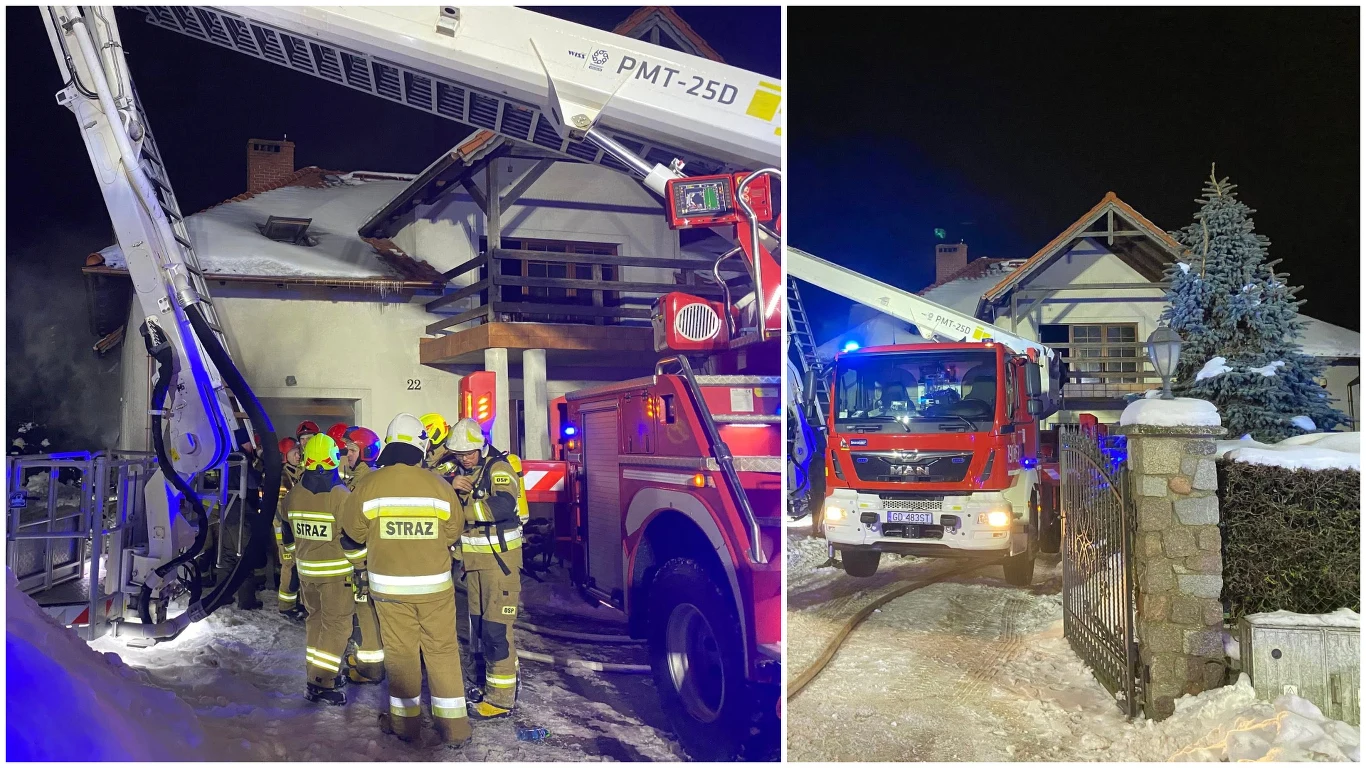 Pożar w rodzinnym domu dziecka. Jedno z dzieci wymagało hospitalizacji Strażacy w odblaskowych mundurach prowadzą akcję gaśniczą przy domu jednorodzinnym pokrytym śniegiem, używając wozów strażackich z podnośnikiem oraz sprzętu gaśniczego, wokół noc i zimowa sceneria.