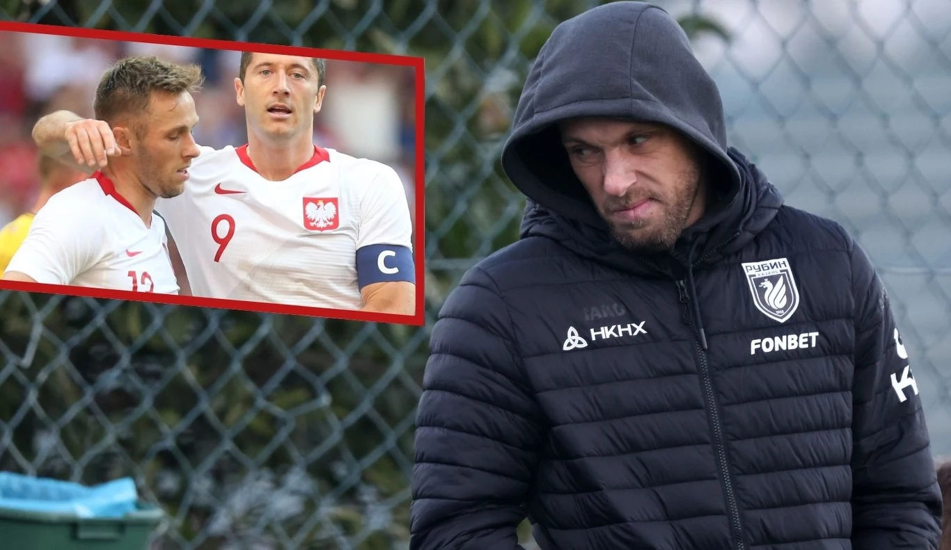 Maciej Rybus przez lata występował w drużynie narodowej u boku Roberta Lewandowskiego. Czy jego synowie pójdą w ślady ojca? Mężczyzna w czarnej kurtce z kapturem stoi na dworze. W lewym górnym rogu kadru znajduje się wstawione zdjęcie dwóch piłkarzy reprezentacji Polski, ubranych w białe koszulki z czerwonym godłem, jeden z nich ma opaskę kapitana.