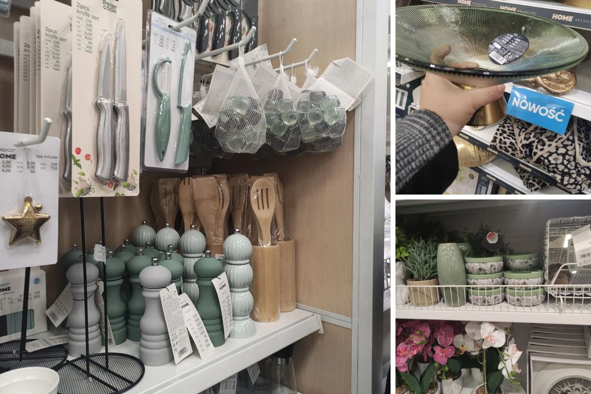 Szereg kuchennych akcesoriów wystawionych na półkach sklepowych, w tym noże, nożyczki, tarki, młynki do soli i pieprzu, drewniane łyżki, miski, zielone naczynia, a także elementy dekoracyjne jak sztuczne rośliny i świeczniki.