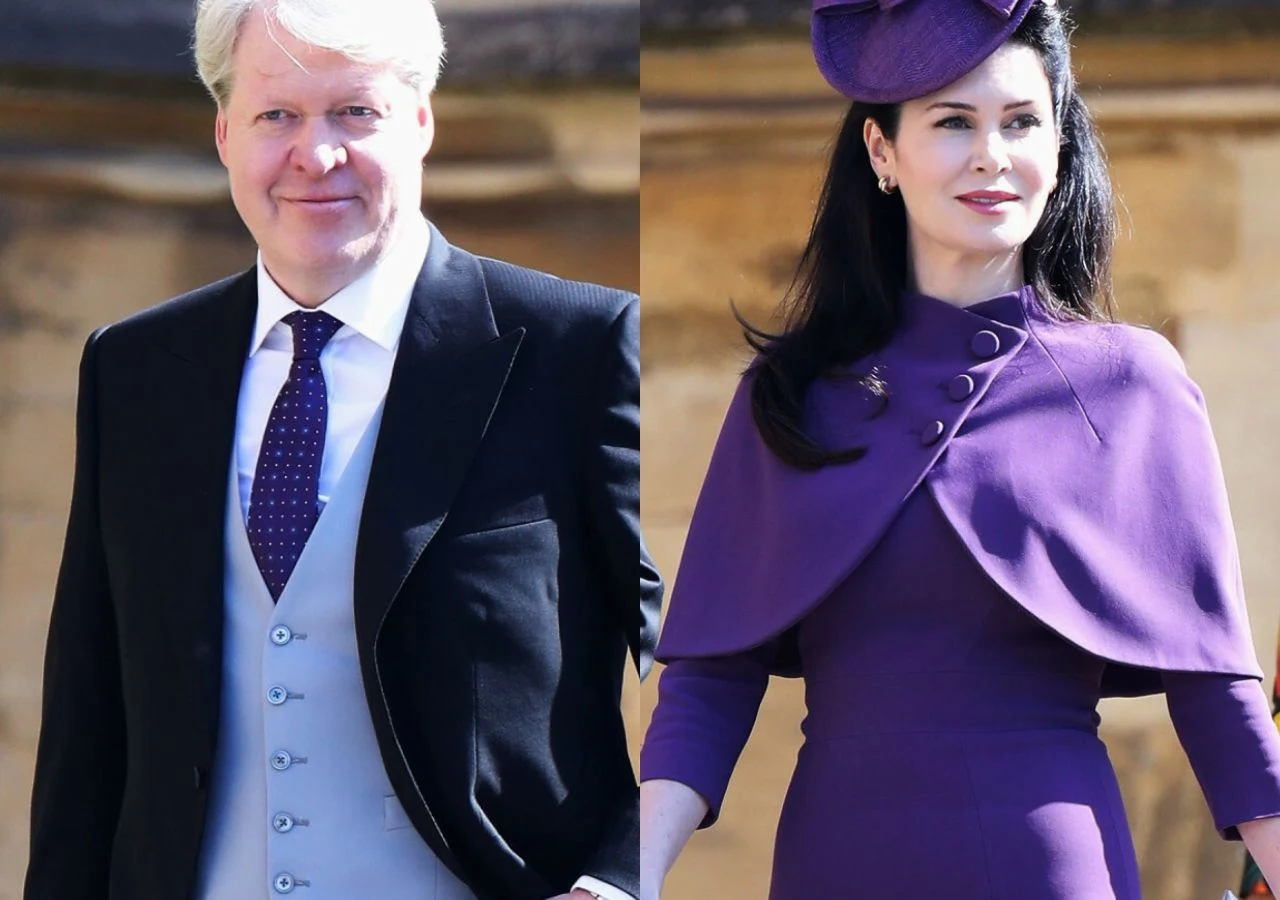 Charles Spencer i Karen Spencer Elegancki mężczyzna w garniturze i kobieta ubrana w fioletową suknię oraz kapelusz, stojący na tle rozmazanej architektury. Oboje wyglądają na uczestników formalnego wydarzenia.